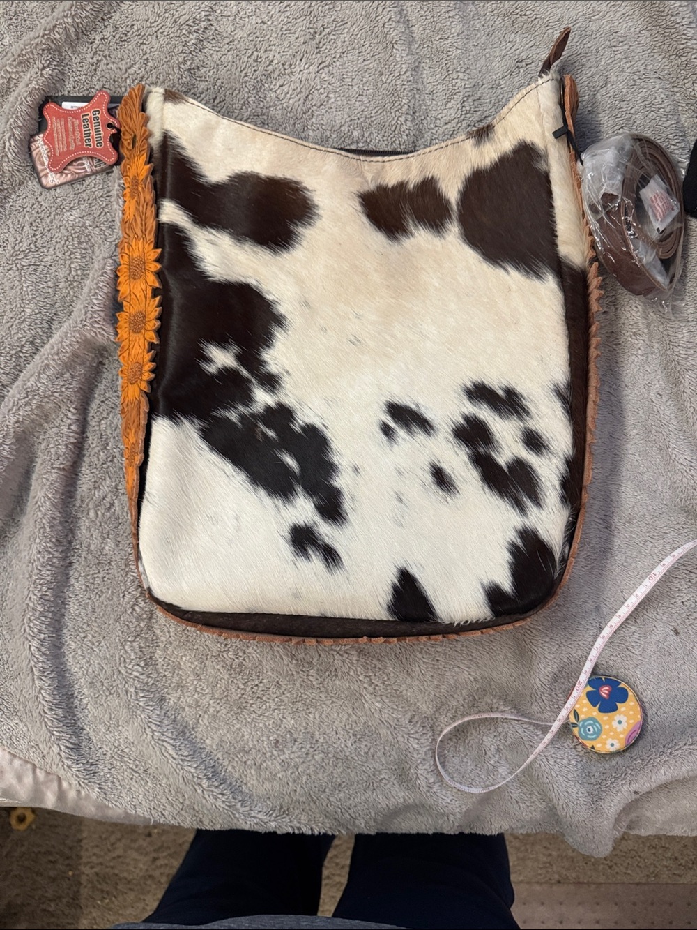 American Darling hair on hide crossbody with leather sunflower trim